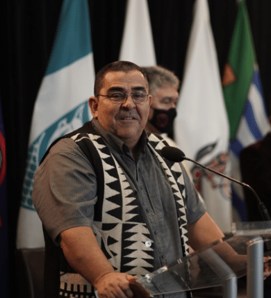 Chief Wayne Sparrow at the podium during the Olympics 2030 MOU announcement December 10, 2021
